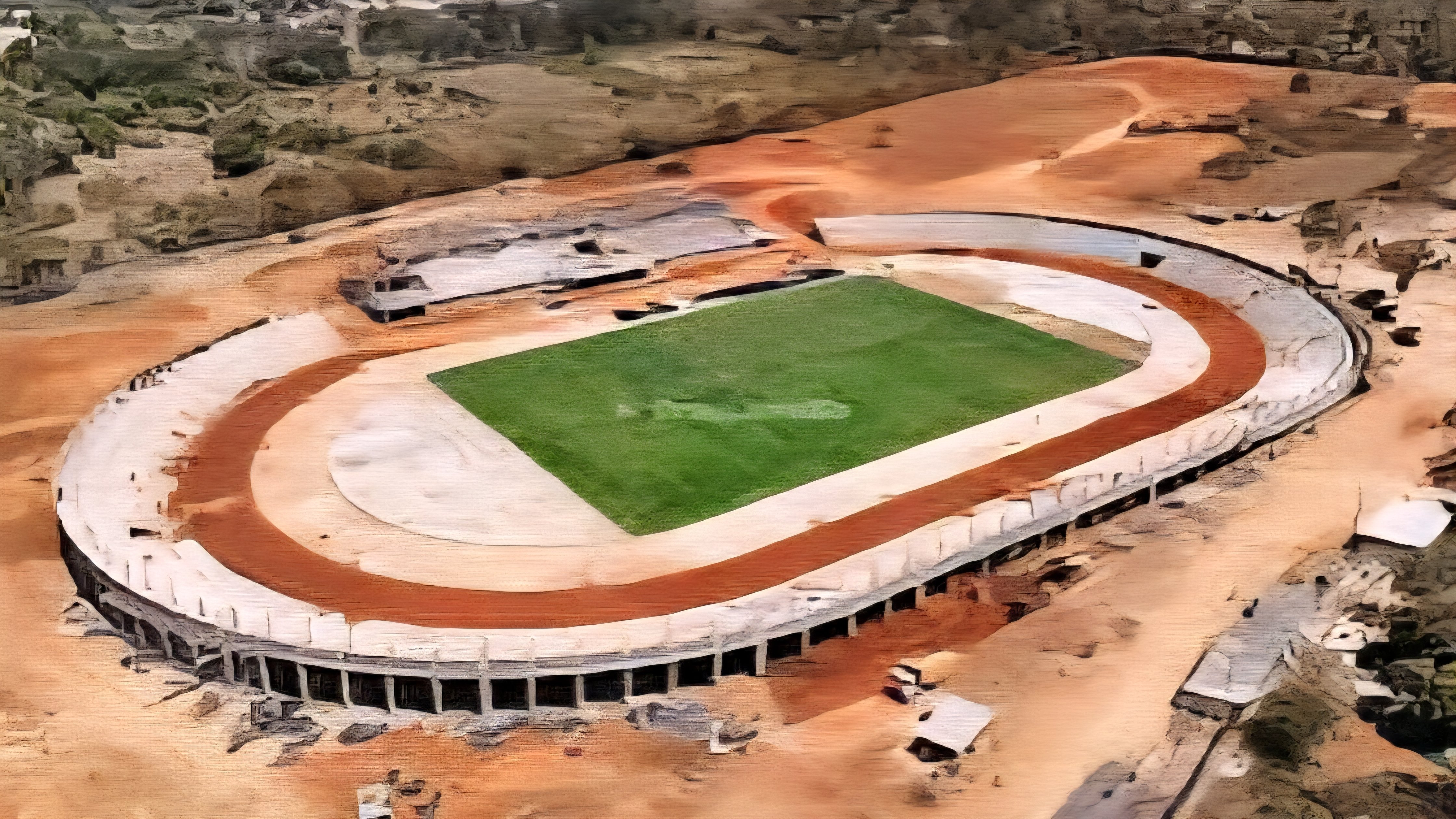 A wide-angle view of a large construction site for a sports stadium in Kenya, showing heavy machinery, structural steel frames, and workers in high-visibility gear against a dry landscape.