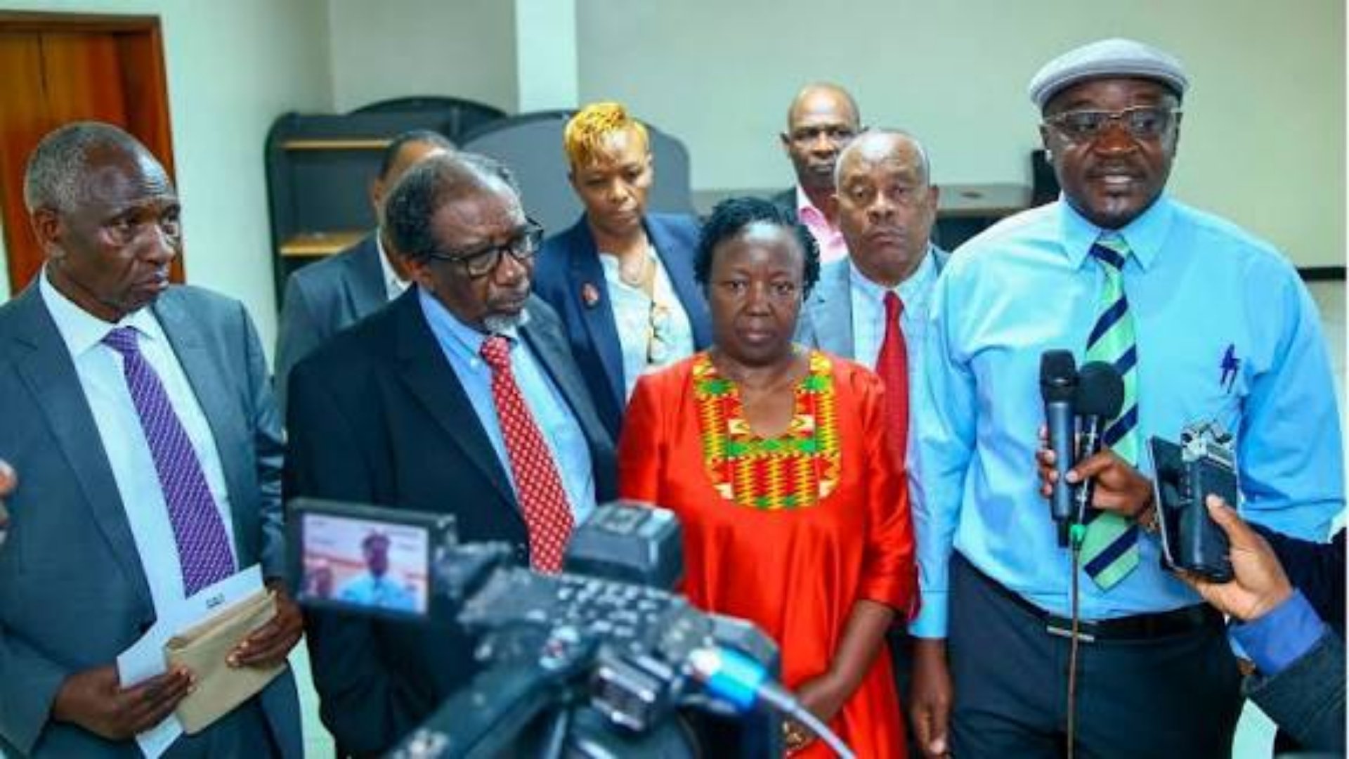 Nairobi County Member of County Assembly (MCA) Waithaka Ward Anthony Kiragu Karanja(right) addresses the media, joined by Members of Kangemi and Dagoretti Landowners, after presenting their petition over the alleged illegal land allocation for the Affor