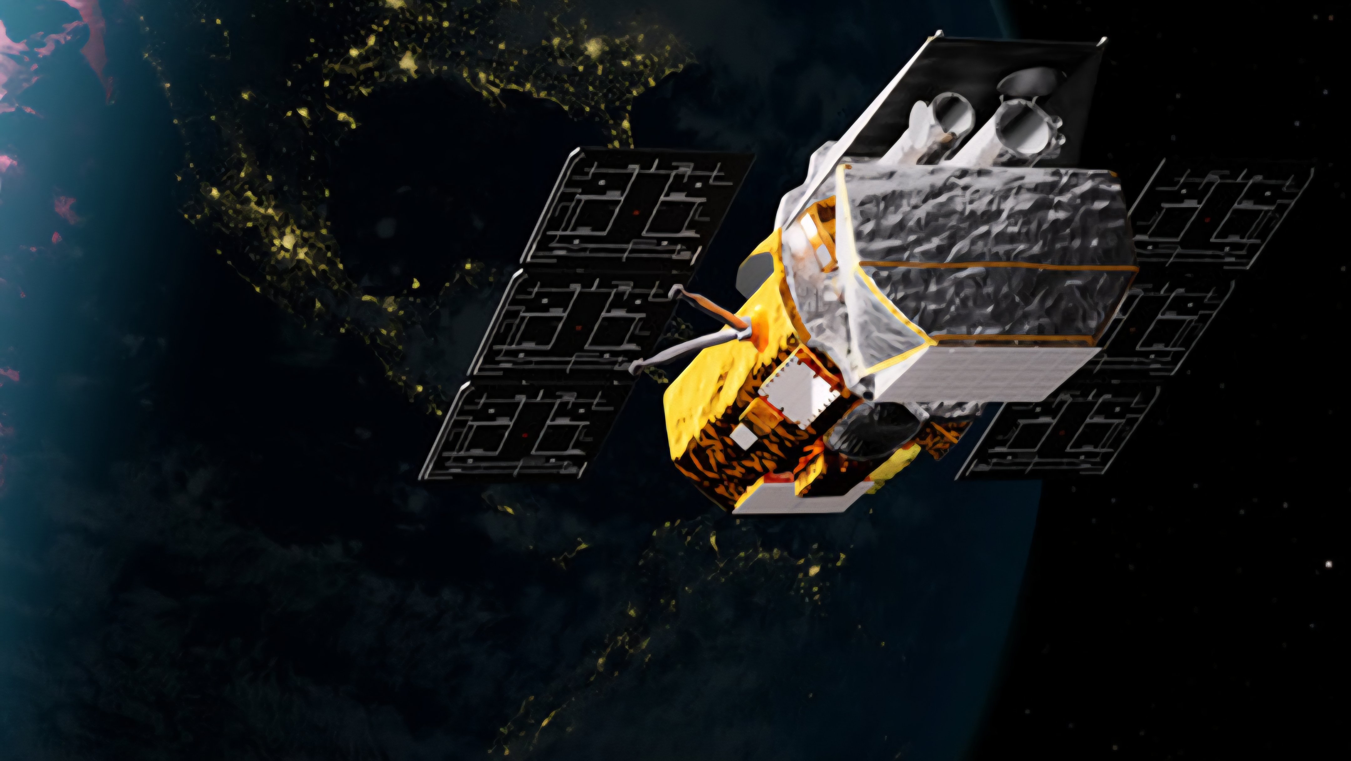 The LINK robotic spacecraft, with its solar panels folded, is shown attached to a Northrop Grumman Pegasus XL rocket inside a processing facility prior to launch.