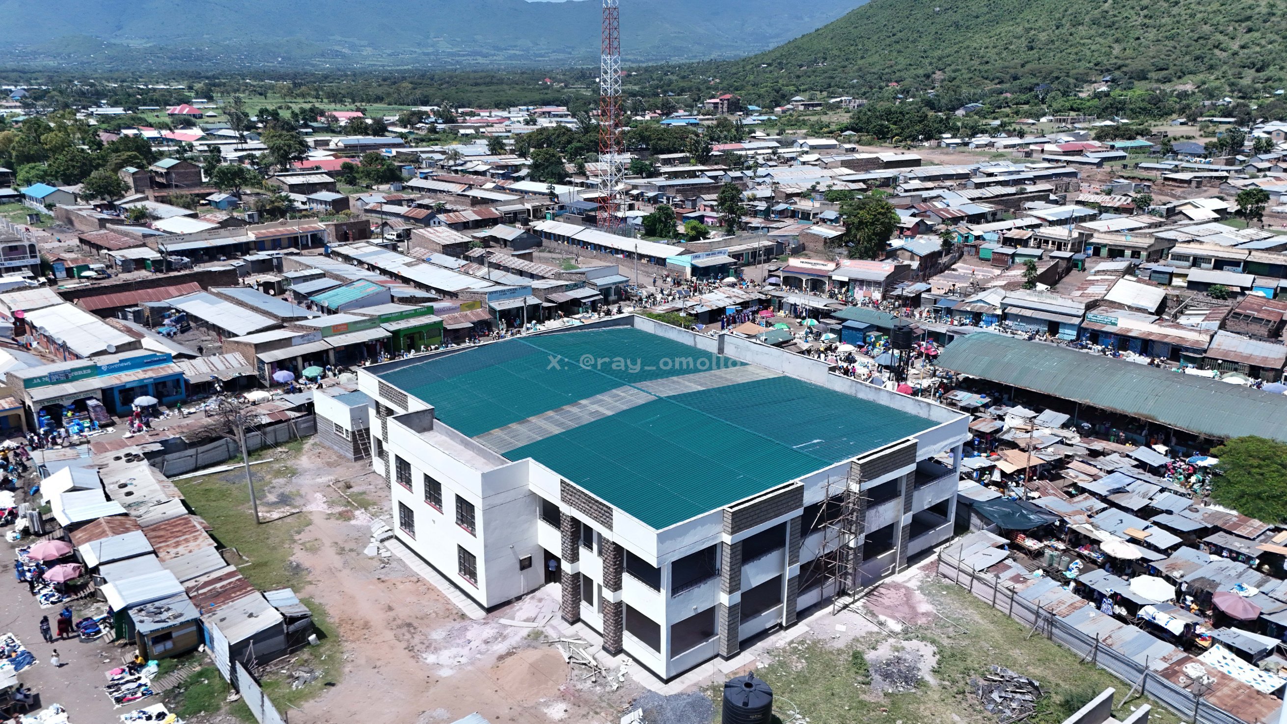 Aerial view of the newly constructed Sindo ESP Market building and surrounding trading blocks near the shoreline in Homa Bay County.