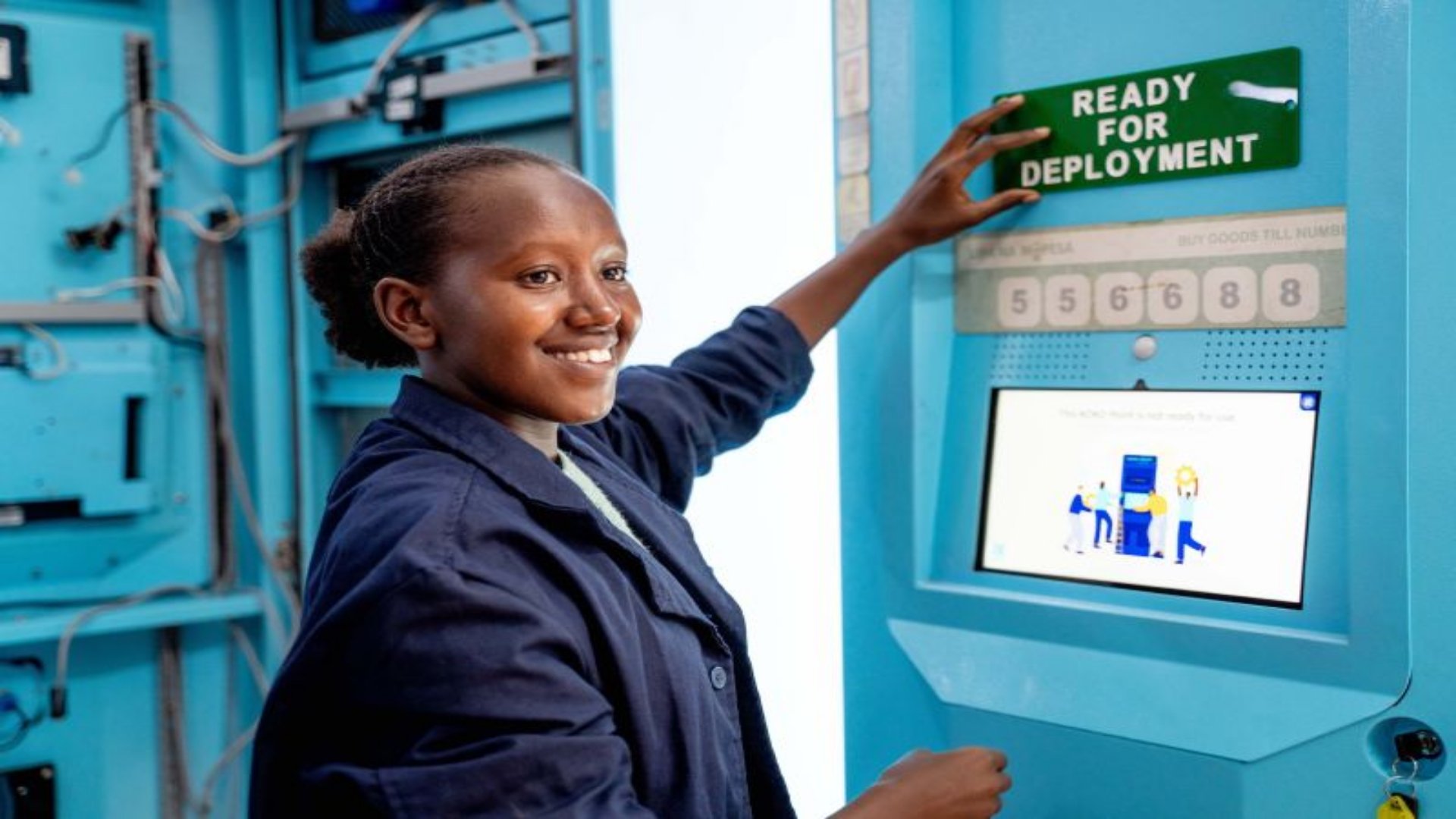 A KOKO Networks bio-ethanol fuel ATM standing outside a retail shop in an urban Kenyan neighborhood.