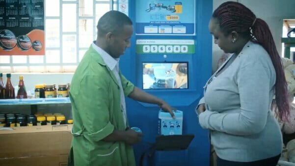 A closed Koko Networks fuel ATM located outside a small retail shop in an urban Kenyan neighborhood.