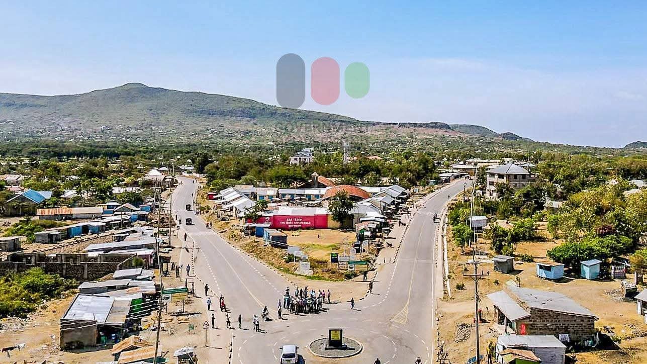 Aerial view of the new tarmacked Rusinga Ring Road along the Lake Victoria shoreline, connecting local communities and offering scenic views.