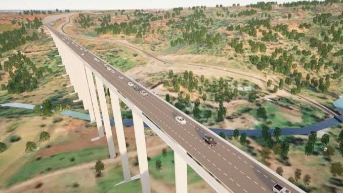 Aerial view of the existing Nithi Bridge showing the steep road descent and the river valley below in Tharaka Nithi.