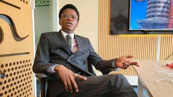 A screenshot of a mobile phone screen displaying an article on the nation.africa website titled New face of news: Rise of TikTok newsfluencers featuring a photograph of Adrian Oluoch in a suit.