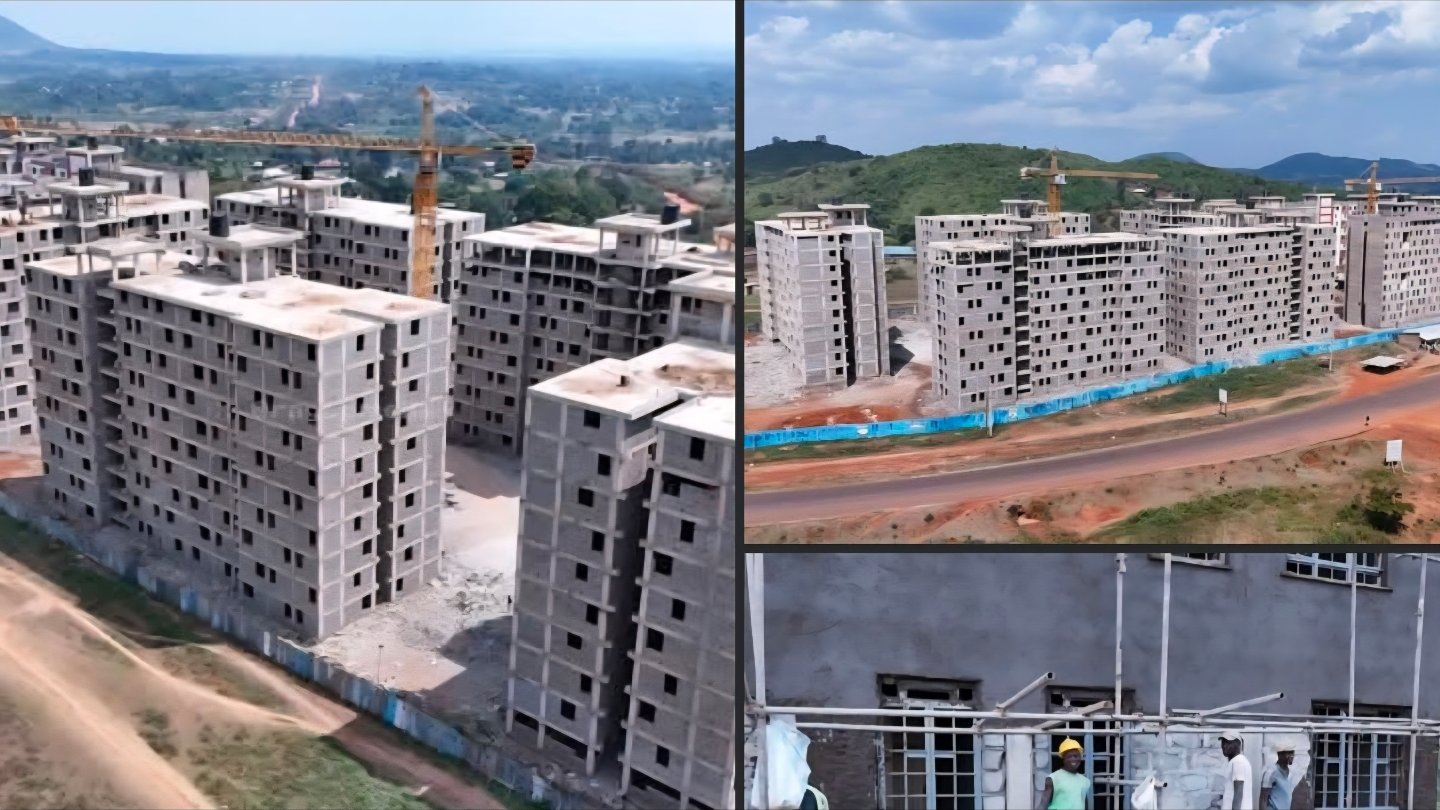 Aerial view of multiple multi-story concrete residential blocks under construction with cranes in Funyula, Busia County.