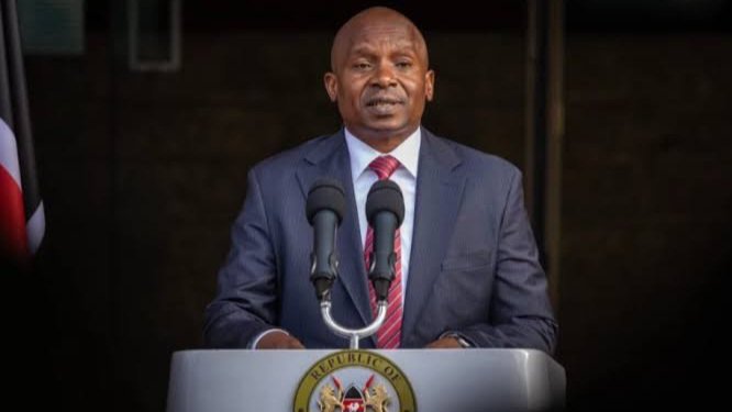 Deputy President Kithure Kindiki speaking at a podium with two microphones during a public event in March 2026.