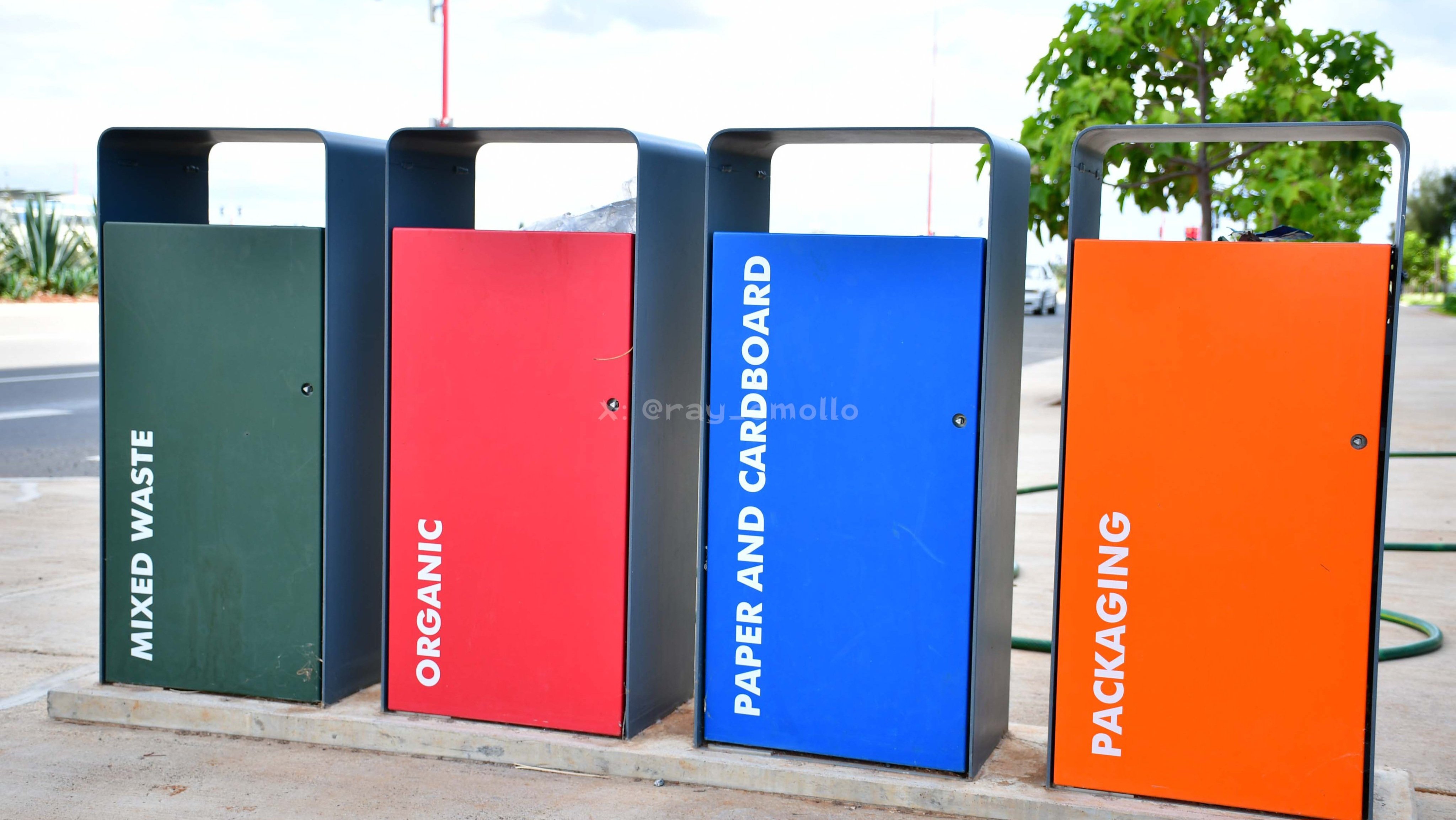 File showing the outdoor waste disposal inlets, the indoor industrial vacuum machinery, the automated processing lines, and the four color-coded recycling bins at Konza Technopolis.
