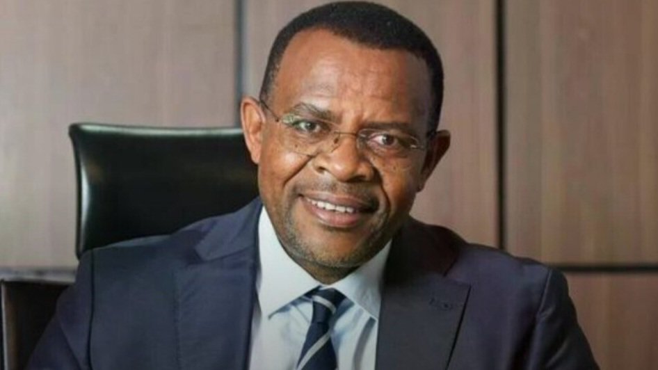 Kenya Electricity Generating Company CEO Peter Njenga posing for an official portrait in a corporate office setting.