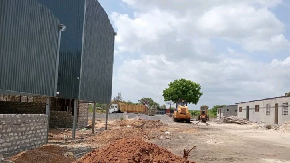 View of agricultural land and industrial site preparation in a coastal Kenyan county