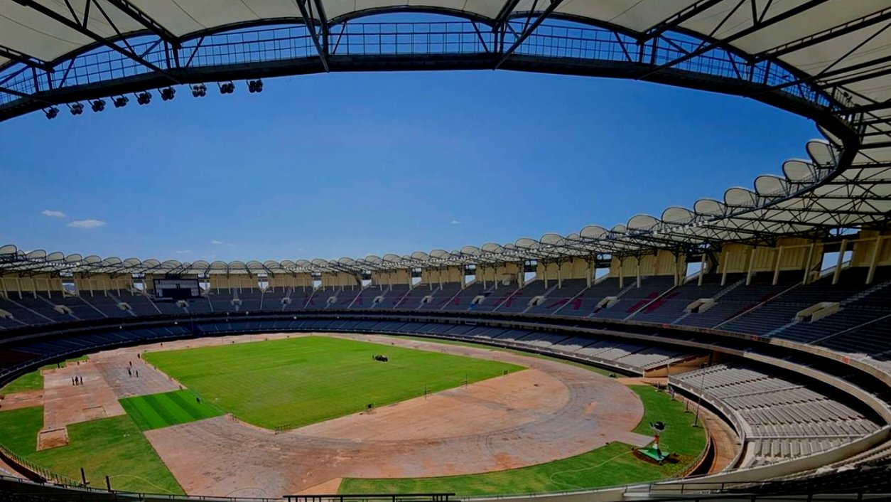 Wide-angle view of the empty stands and pitch at the Moi International Sports Centre, Kasarani, prior to the commencement of renovation works.