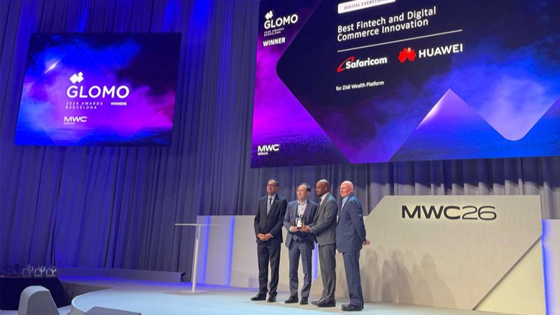 A wide shot of the GSMA GLOMO Awards stage at MWC Barcelona 2026 with digital branding and award trophies visible.