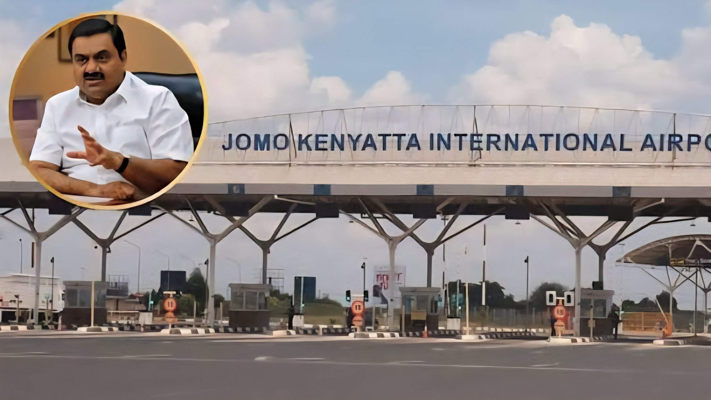 Exterior view of the entrance gates at Jomo Kenyatta International Airport in Nairobi, showing the main signage and vehicle security checkpoints.