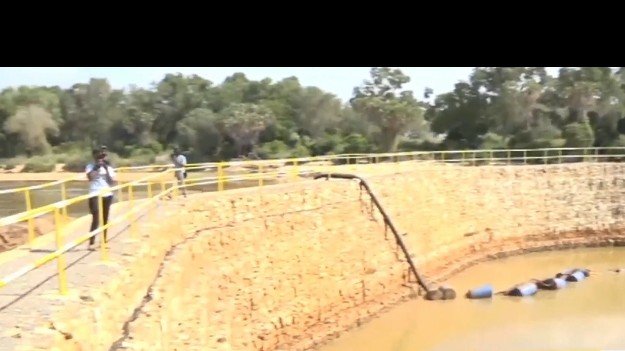 Aerial view of the Galana Kulalu dam construction site with earthworks and irrigation channels under development.