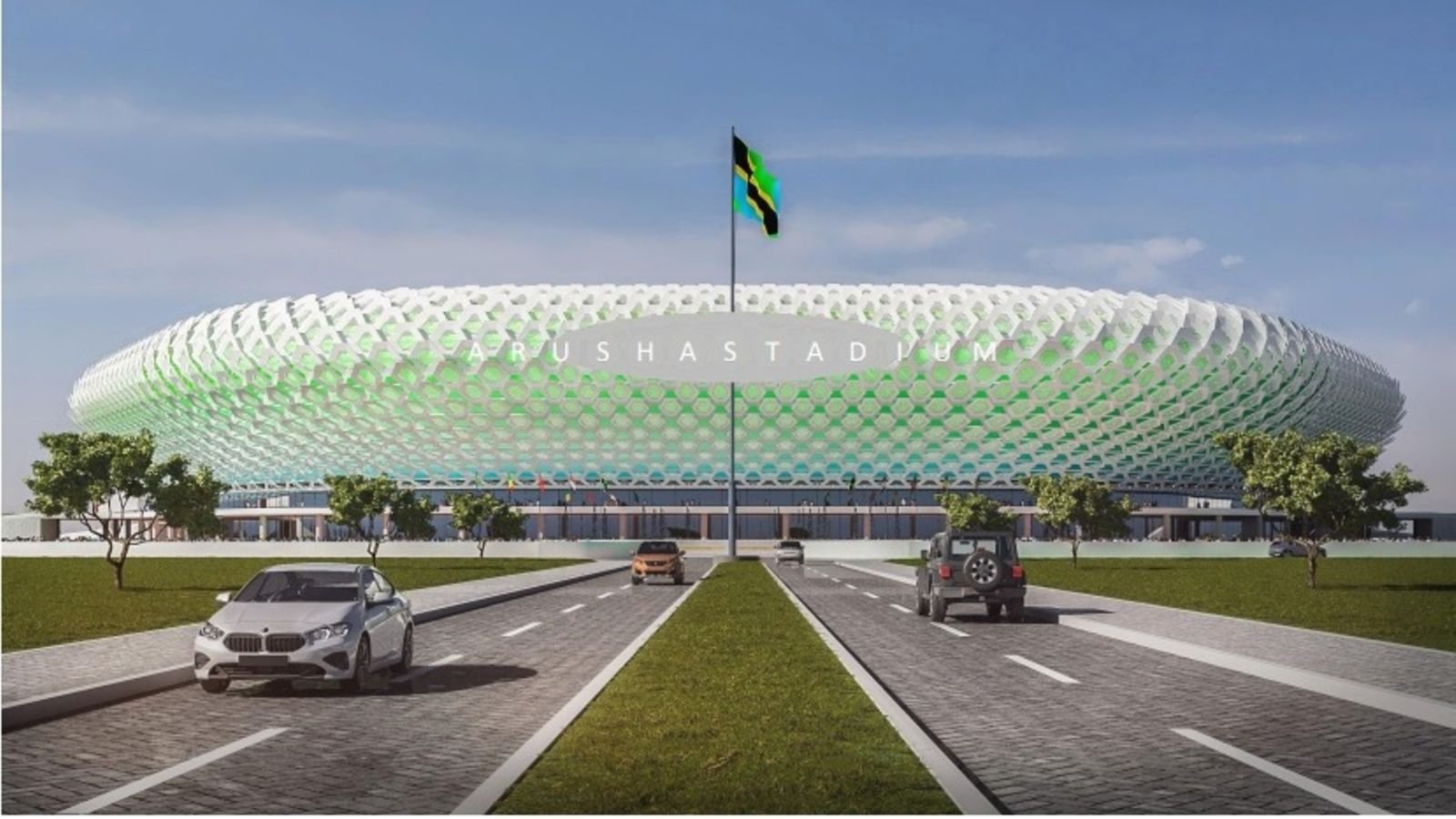 Aerial view of the Samia Suluhu Hassan Stadium under construction in Arusha, Tanzania, showing the circular steel framework and surrounding site progress as of early 2026.