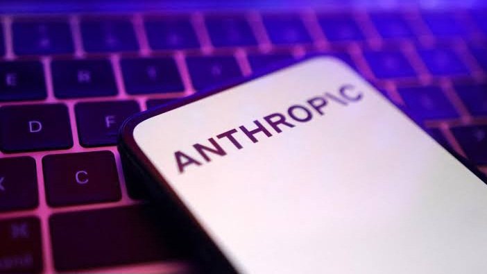 A close-up view of a smartphone screen displaying a tech news update about Anthropic shutting down its Fable 5 and Mythos 5 AI models.