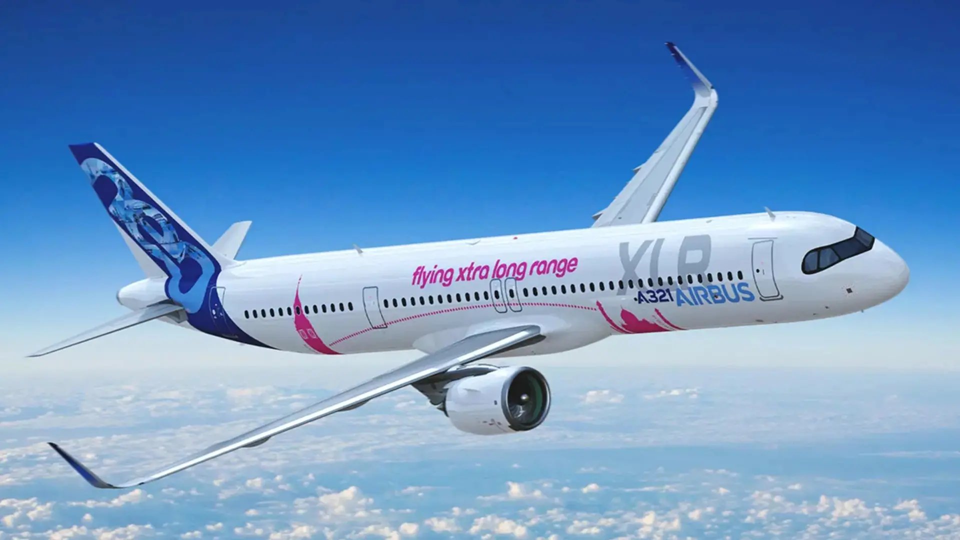 Airbus A321XLR passenger aircraft flying in mid-air against a blue sky background.