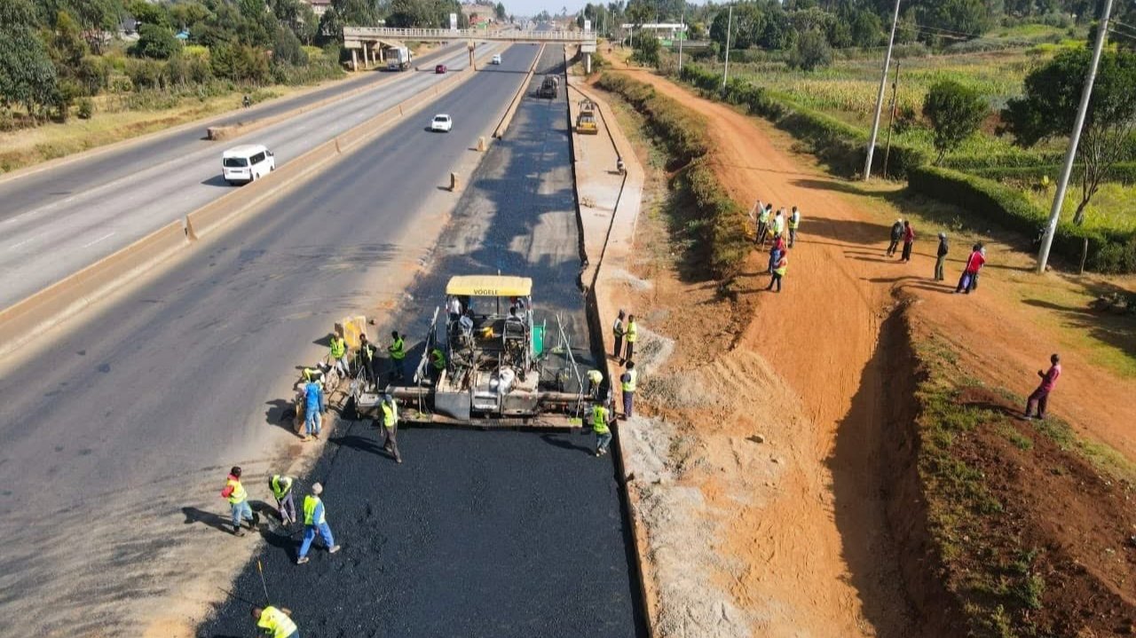 Workers and machinery on the Rironi to Naivasha highway expansion site in Kenya.