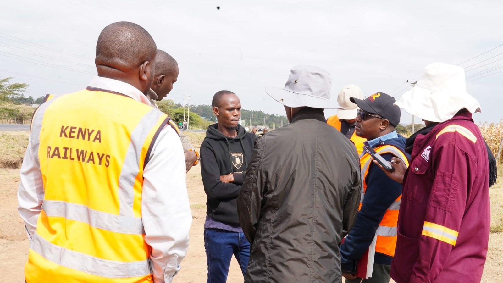 Surveyors and local officials examining terrain and mapping property boundaries during the ongoing Narok County technical evaluation for the Standard Gauge Railway project.