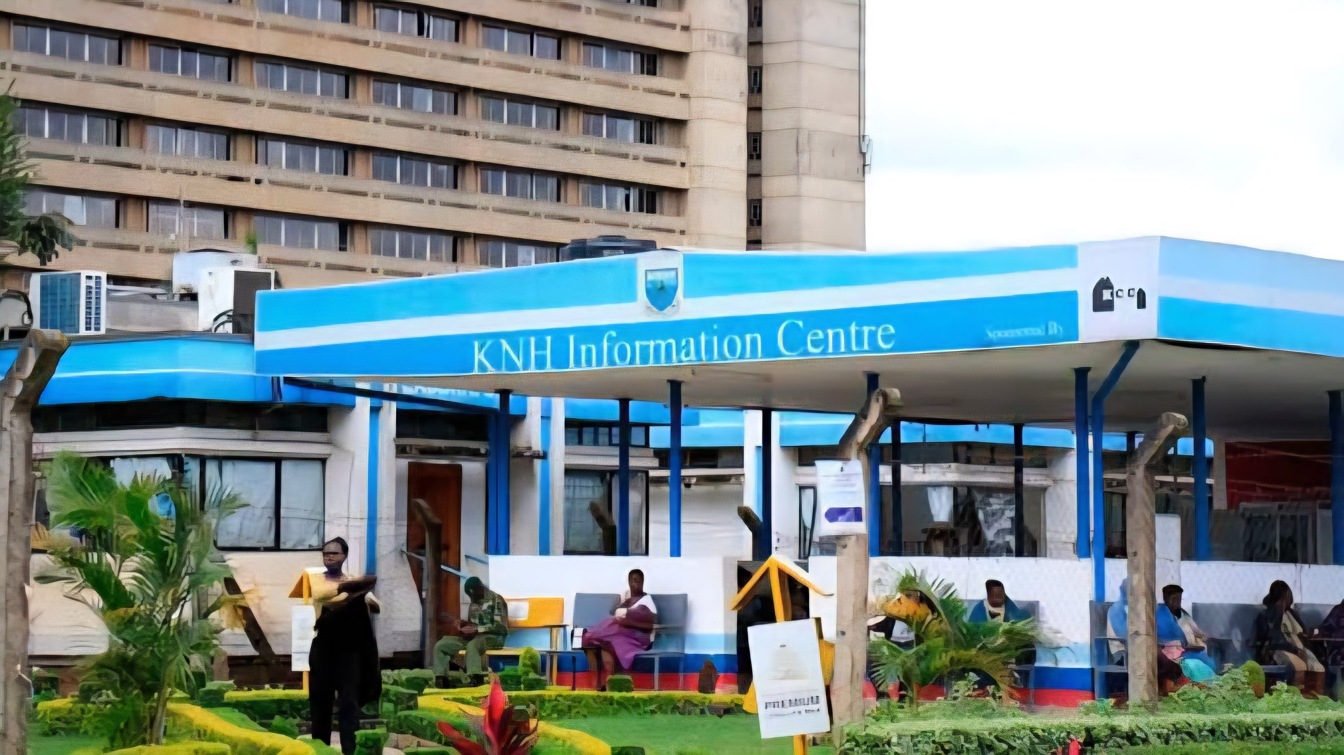 A view of the Kenyatta National Hospital Information Centre building with the hospital's main tower visible in the background.