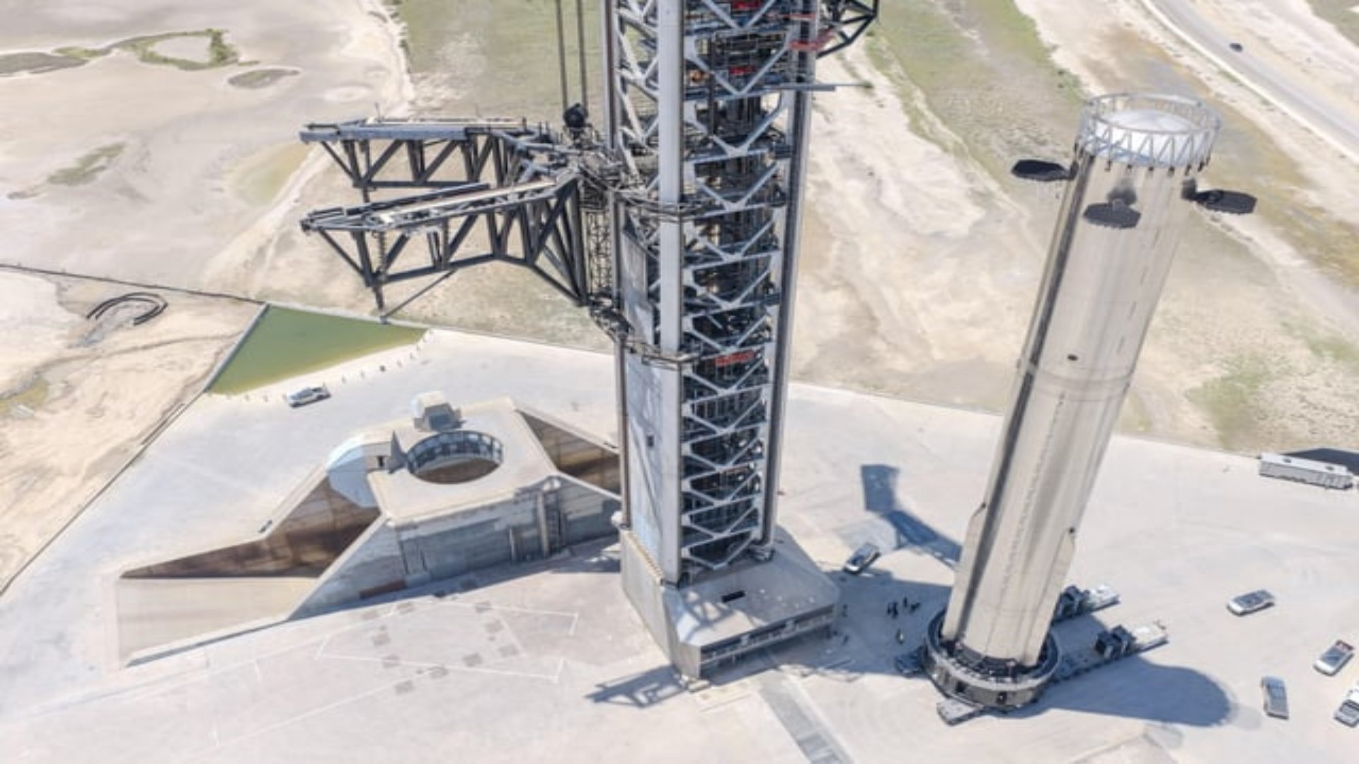 Booster 21 Arrives at Starbase as Flight 14 Preparations Continu