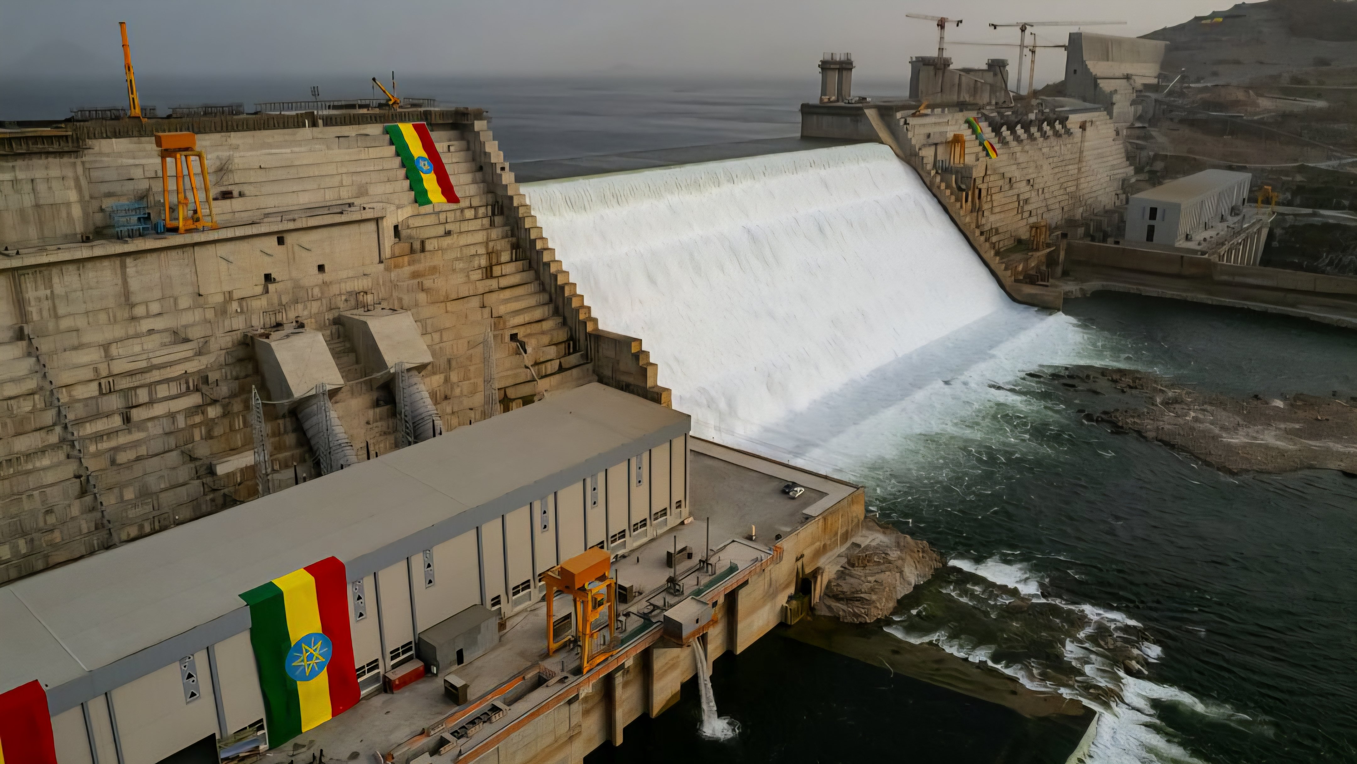 A wide view of the concrete spillways and main structure of the Grand Ethiopian Renaissance Dam in Ethiopia.