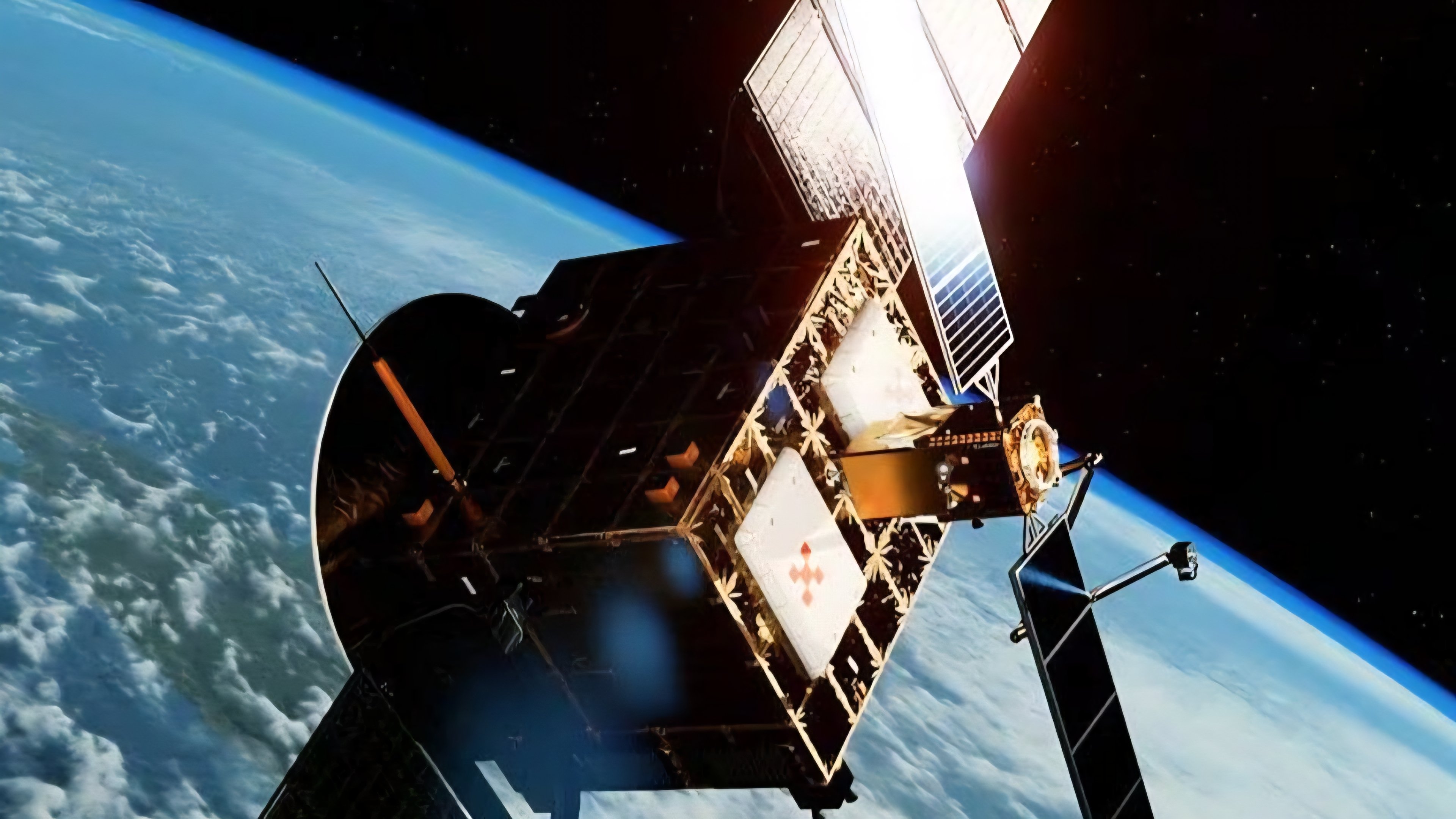 A digital illustration of a maneuverable military satellite with visible thrusters approaching a larger spacecraft in the darkness of Earth's orbit.