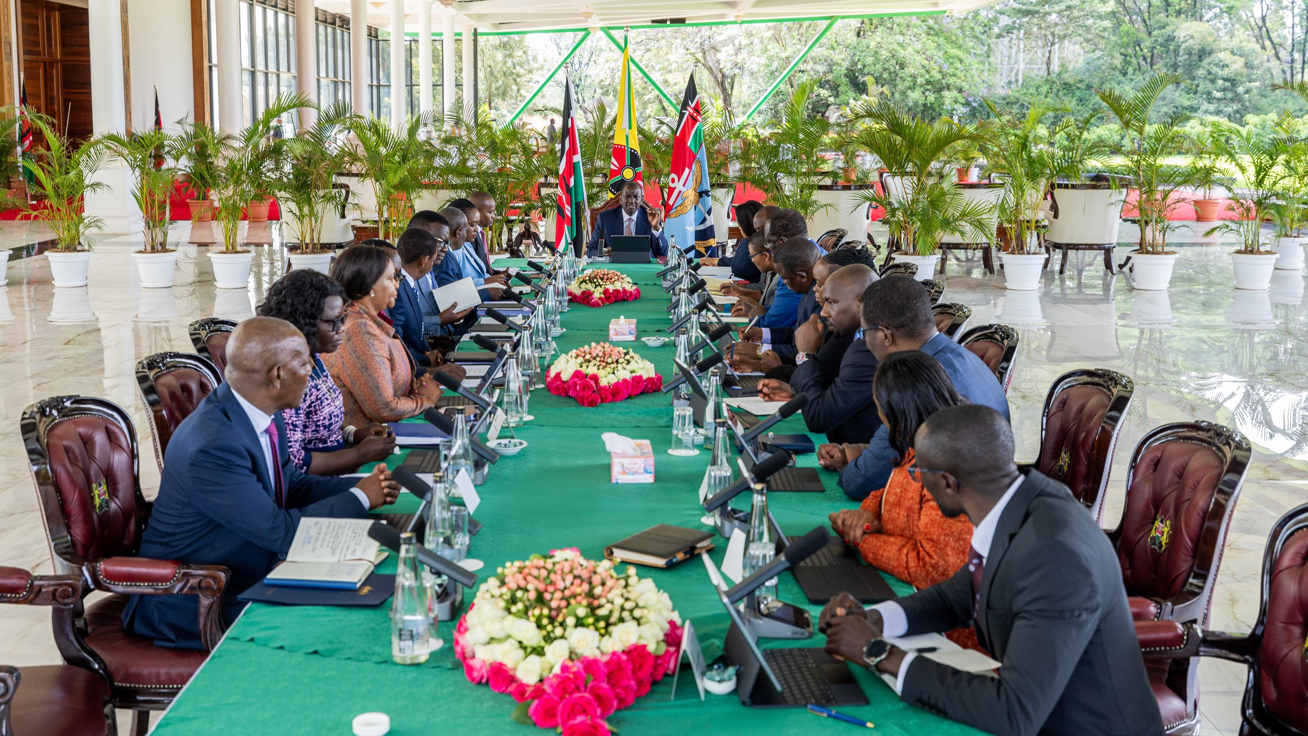 President William Ruto and Cabinet Secretaries seated at a long conference table during a formal meeting at State House Nairobi.