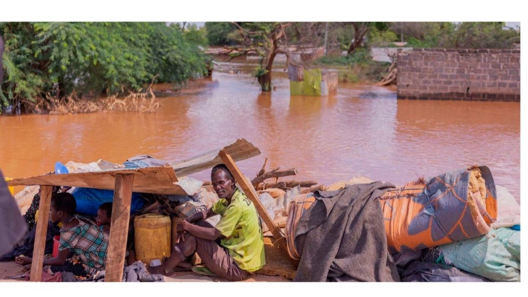 Displaced family taking shelter from the sun in a makeshift camp in Garissa County after floods
