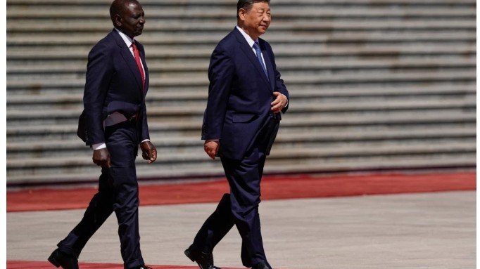 Chinese President Xi Jinping welcoming Kenyan President William Ruto at the Great Hall of the People in Beijing on April 24, 2025.