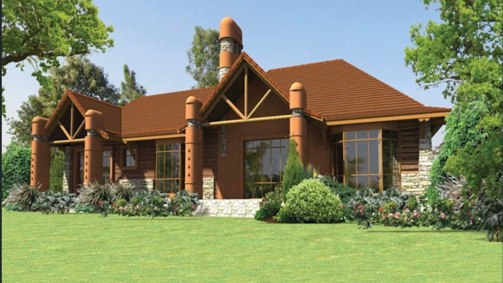 A modern brown standalone suburban house with a green tiled roof and a manicured front lawn.