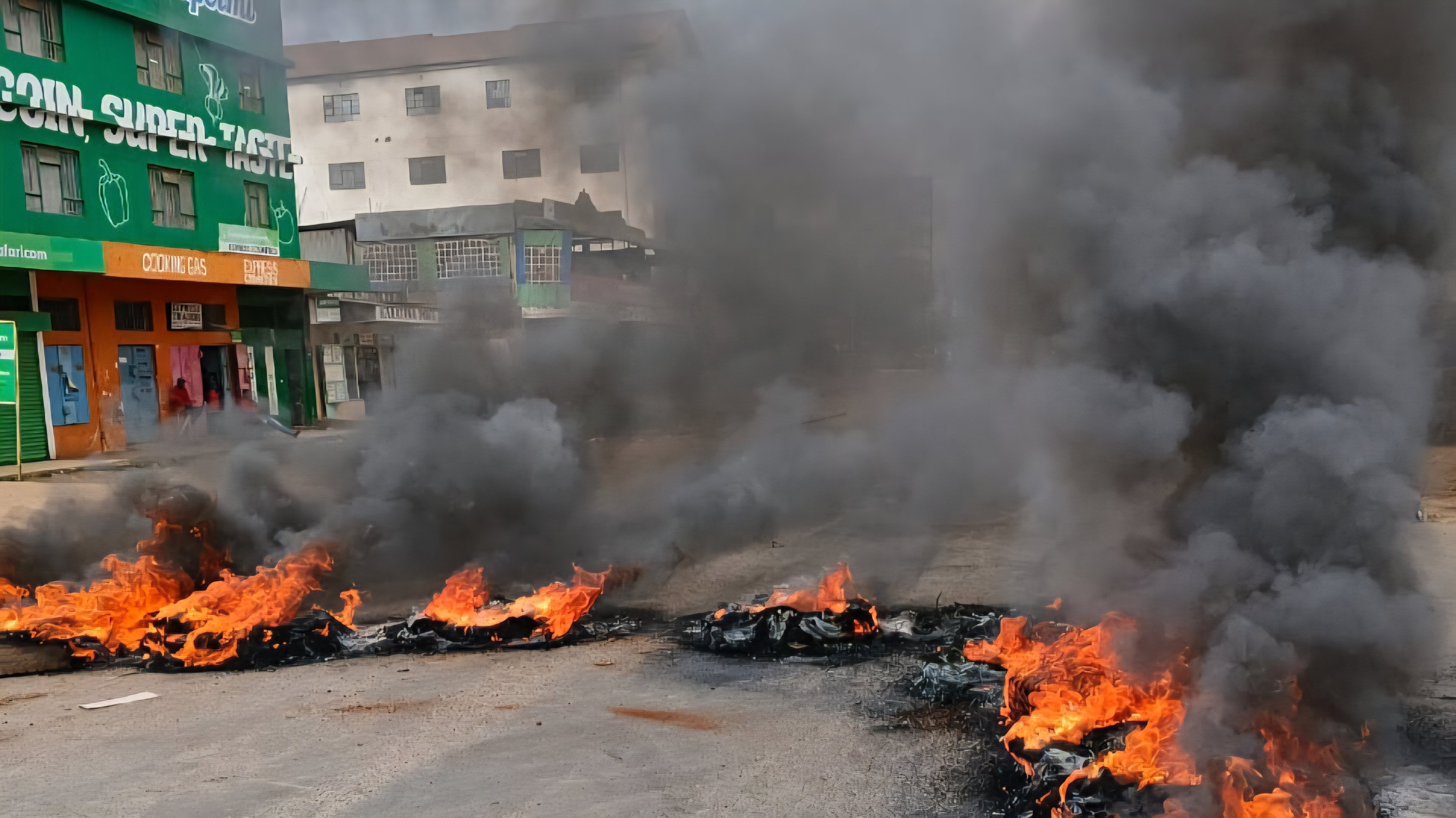 Barricaded section of Karatina-Nyeri Road with stones and burning tyres during unrest in Nyeri County