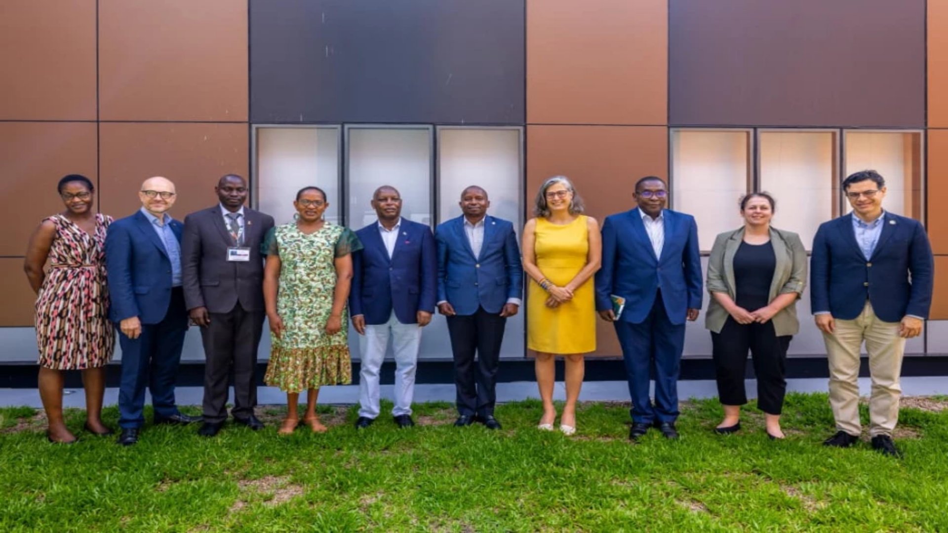 Deputy President Kithure Kindiki shaking hands with a UN representative at the COP 30 Conference in Belem, Brazil, discussing climate resilience programs.