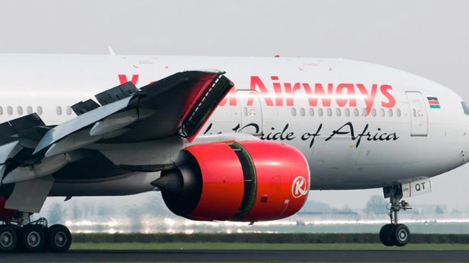 Kenya Airways aircraft positioned on runway preparing for departure