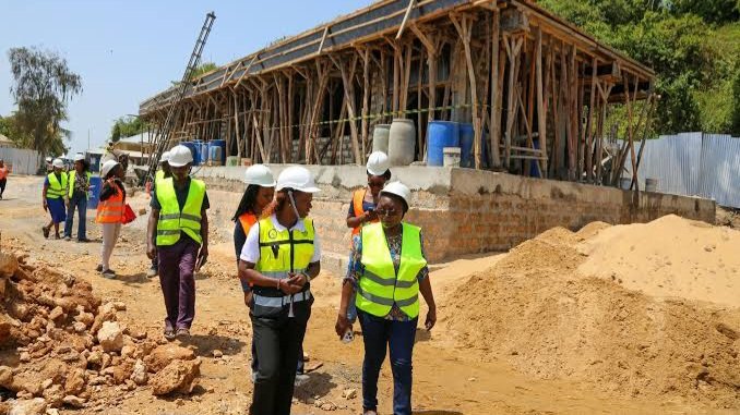 Industrial heavy equipment operating at a mineral extraction and site preparation project in Kilifi County.