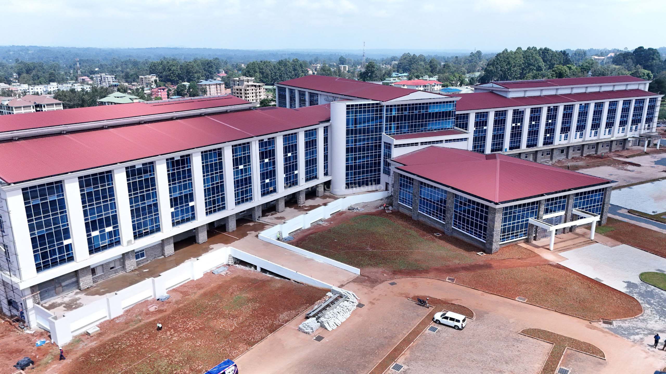 Four-storey hospital block under construction at Kakamega Teaching and Referral Hospital during an inspection visit by national and county officials on 22 June 2026.