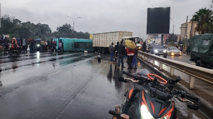 Emergency responders assisting injured passengers after a lorry collided with a bus near Safari Park along Thika Road, Nairobi