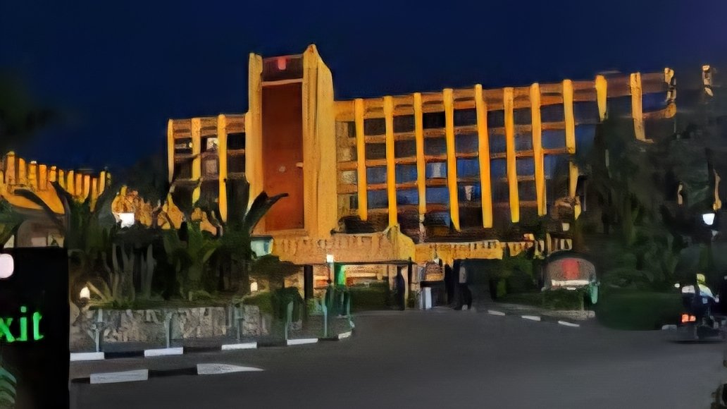 Exterior view of the entrance and landscaped grounds at Nairobi Serena Hotel in Kenya.