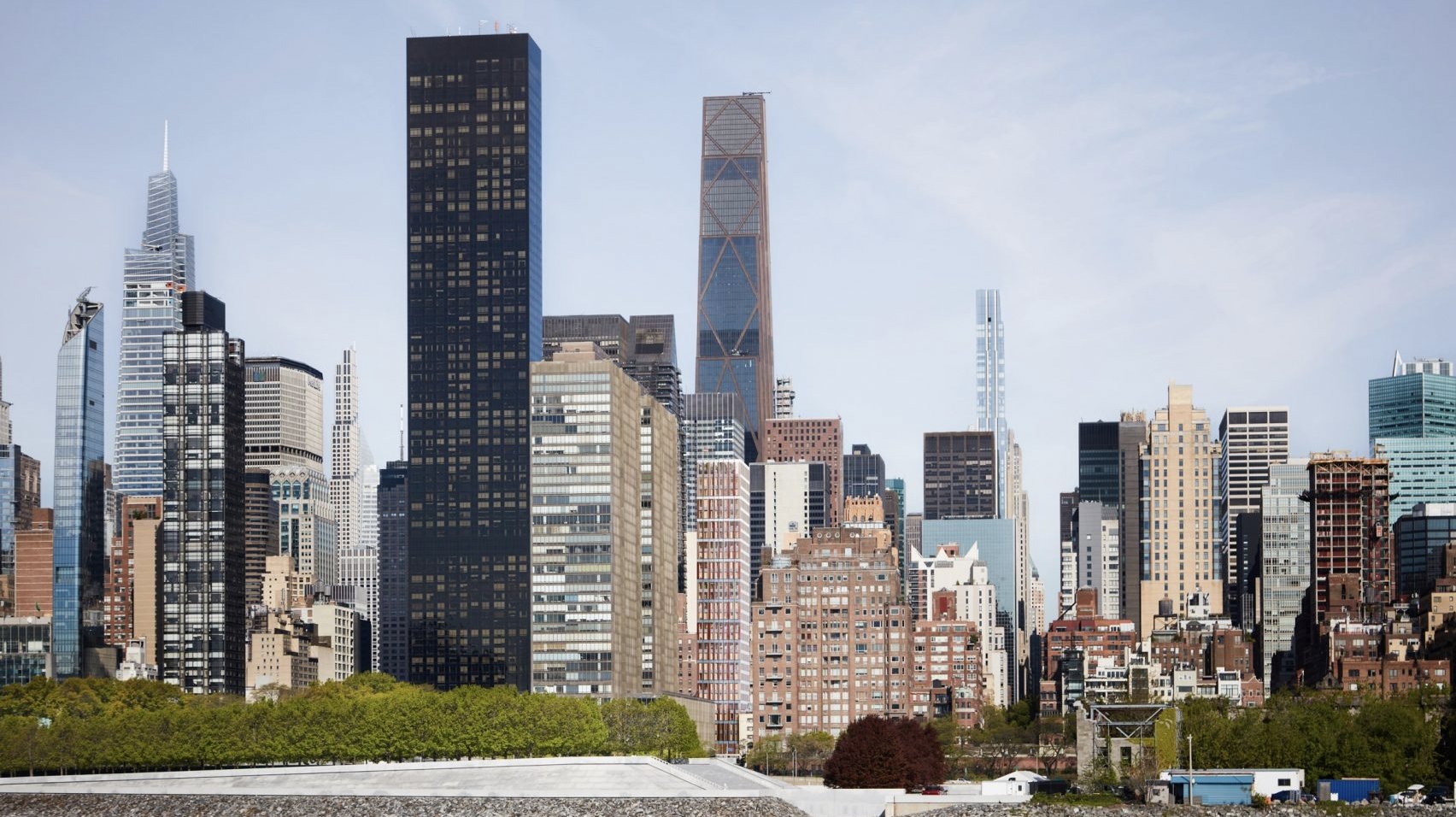 Rendering of German House skyscraper in Manhattan showing a redesigned facade with bands of colour.