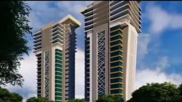 Architectural rendering of a high-rise twin tower building with a glass facade and a multi-story podium in an urban setting.