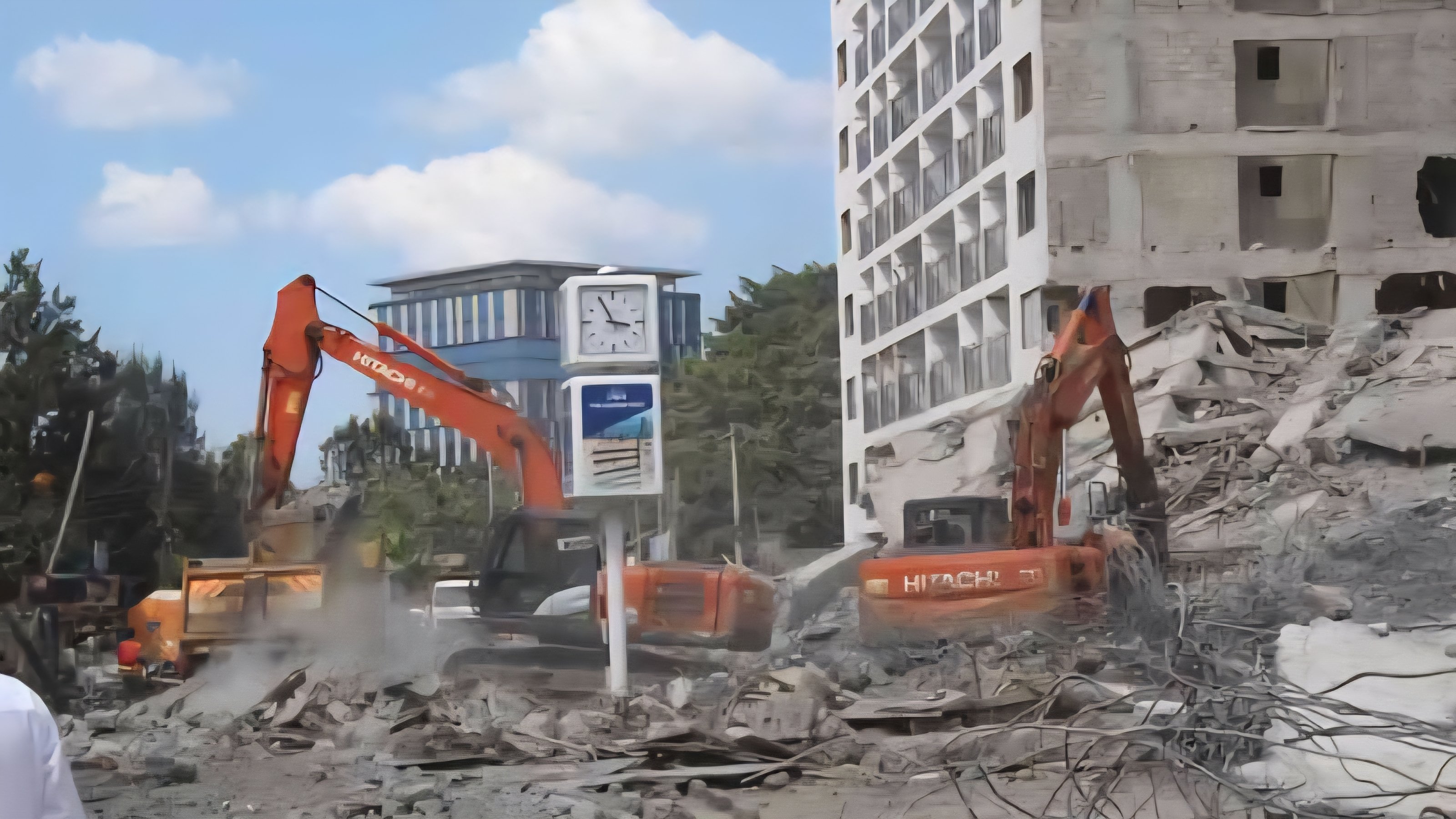 Rescue workers and heavy machinery at the site of a collapsed 14-storey building in South C, Nairobi.