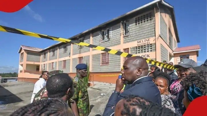 CS Murkomen at the school after a fire burned the pictured dormitory with students inside