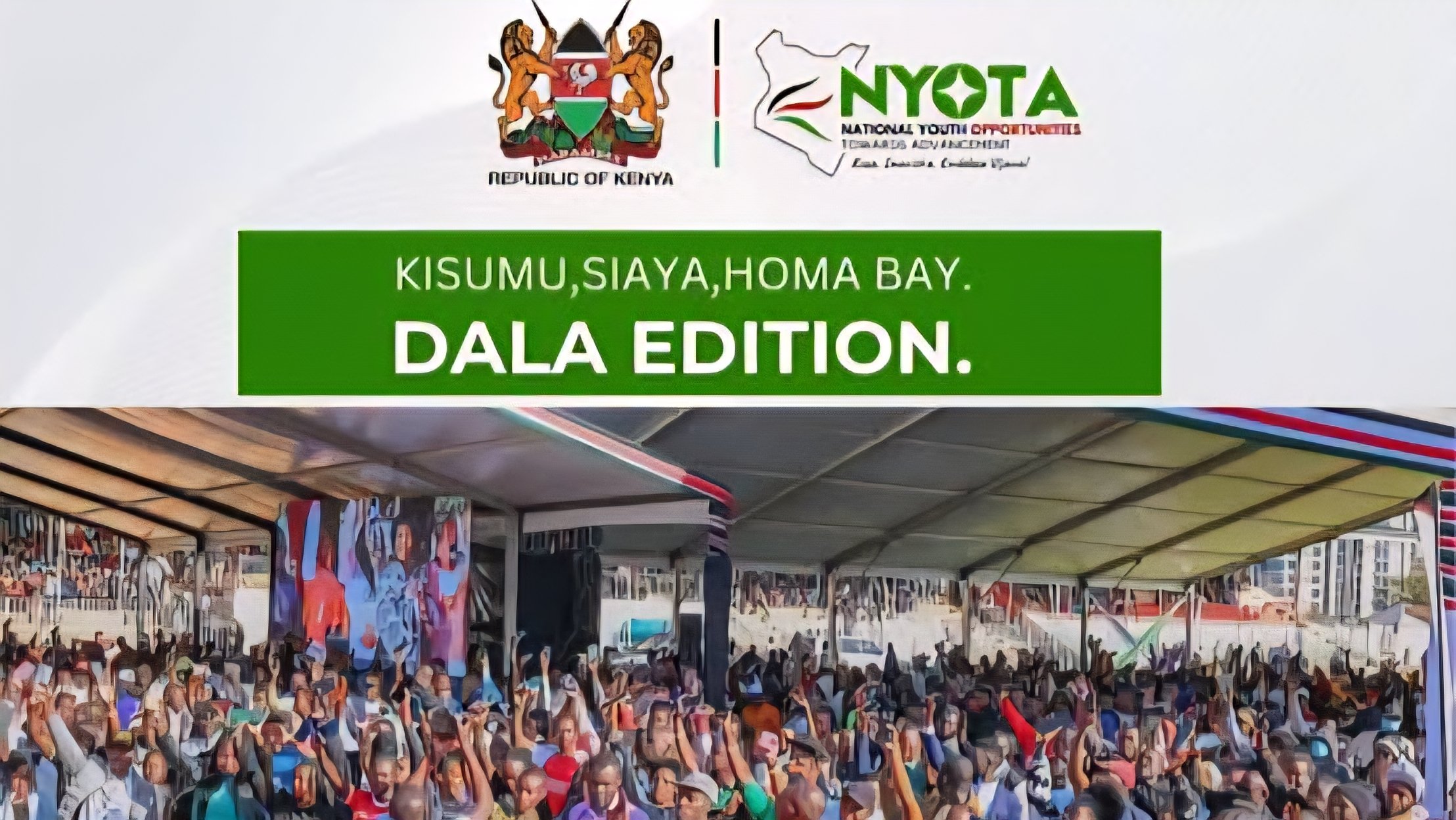 A speaker stands on a stage with a microphone in front of a crowd at the Jomo Kenyatta International Stadium in Kisumu during the NYOTA capital disbursement event.