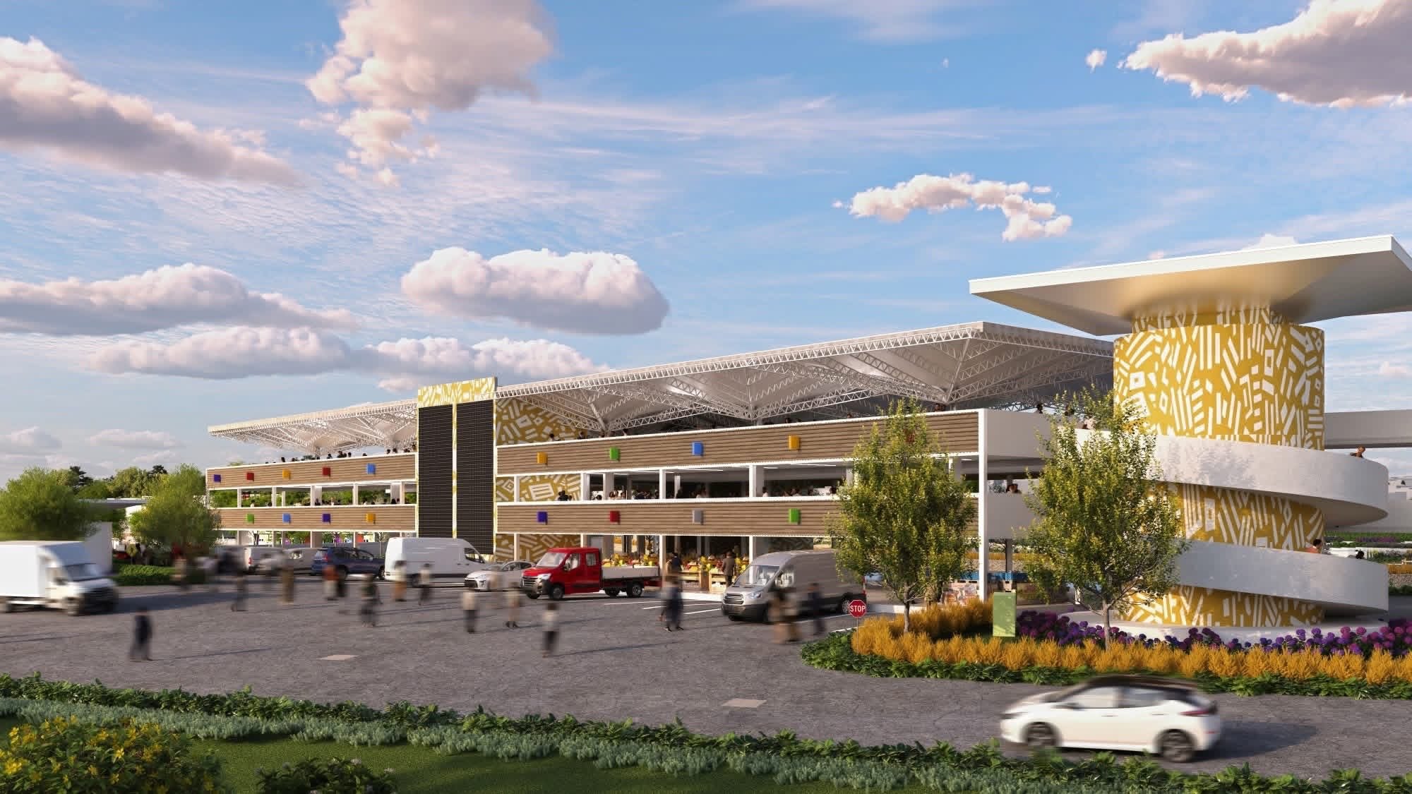 3D architectural rendering of the modern multi-story Gikomba Market building in Nairobi, featuring open parking areas, spiral access ramps, yellow decorative facade panels, and delivery vehicles parked outside under a blue sky.