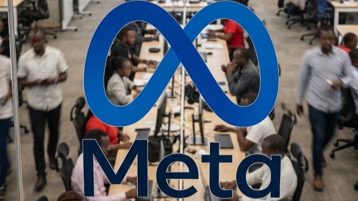 A blurred interior view of a busy modern office space in Nairobi with a Meta logo overlaid on the foreground.
