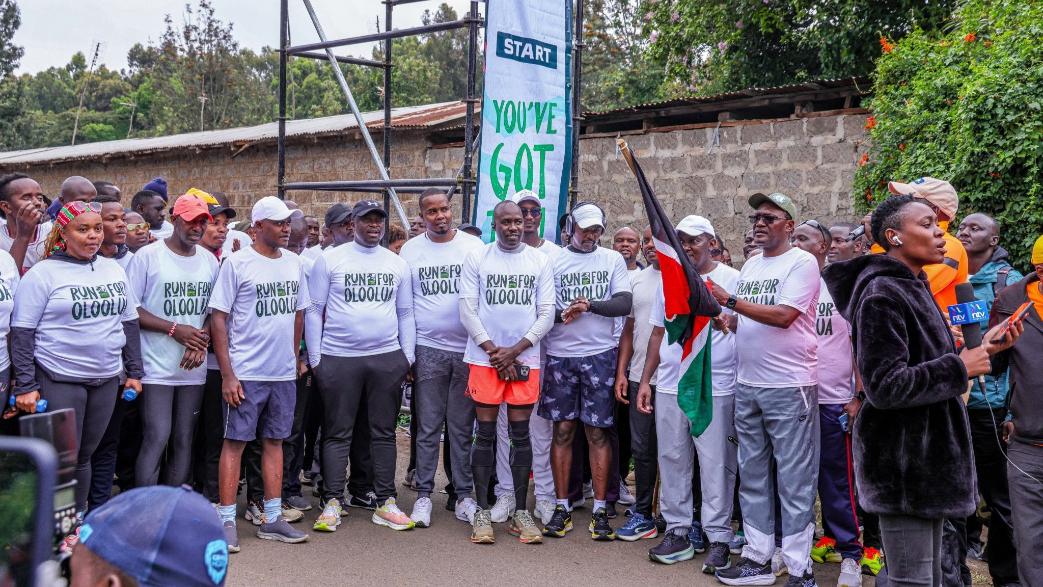 A group of Kenyan government officials and members of the public participating in the Oloolua Forest Run to support conservation.