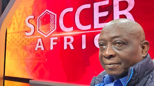 Ivorian sports journalist Mamadou Gaye speaking at a press conference in Rabat, Morocco, during the 2025 AFCON.