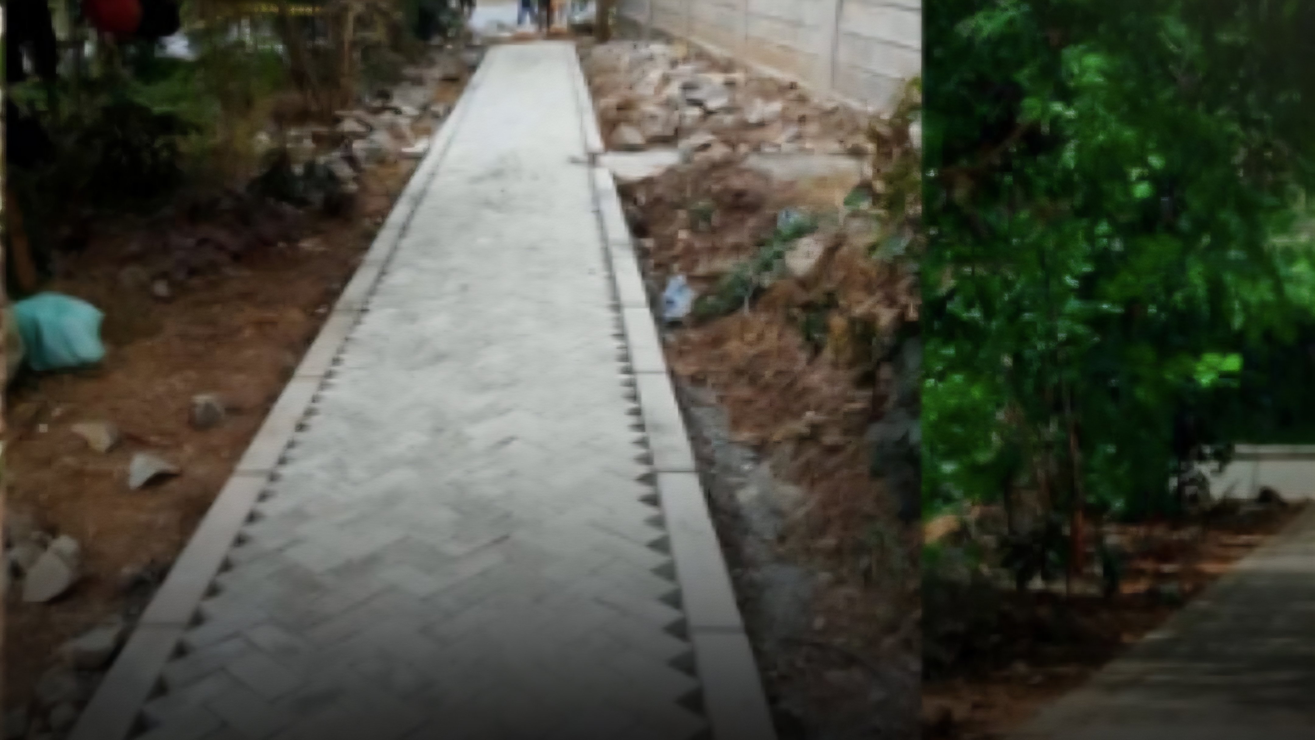 Newly paved pedestrian walkway with carbon-mineralized concrete paving blocks in Upper Hill, Nairobi.