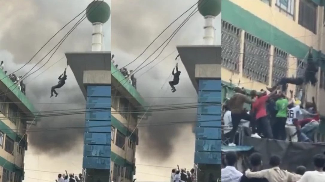 Man descending on rope from burning Yare Plaza building in Eastleigh Nairobi March 3 2026