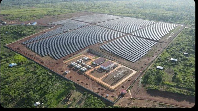Aerial view of a solar power plant in the Central African Republic with rows of solar panels generating electricity